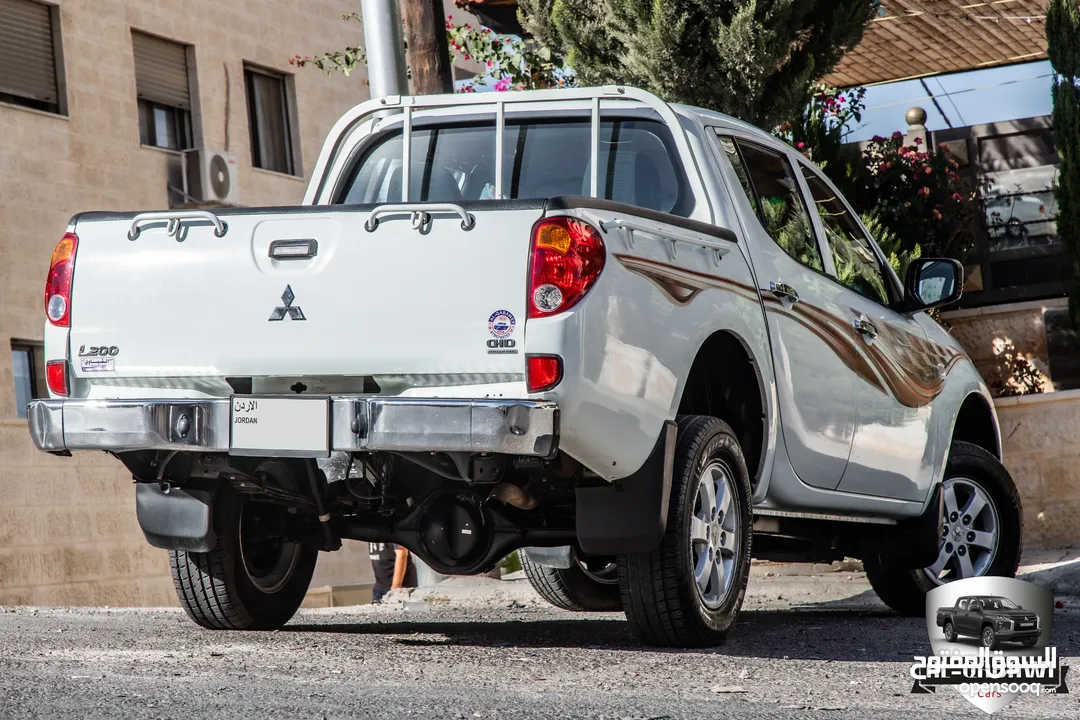 Mitsubishi L200 2012  البكب مميز جدا و قطع مسافة 143,000 كم