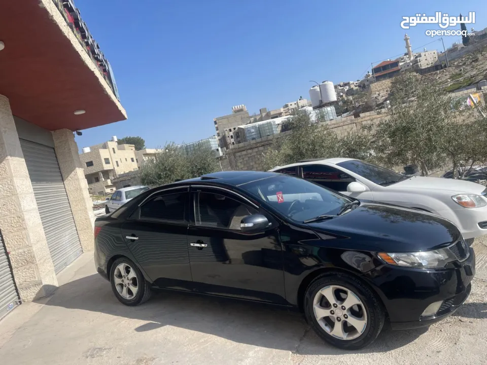 كيا فورتي 2009 , فتحة سقف، اوتومات 4 غيار