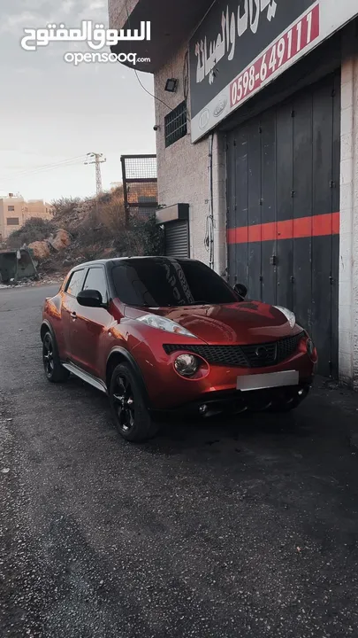 نيسان جوك 2012  محرك 1.6  توماتيك  جير مطور 100% ع الفحص  خالية من الضربات مغير لون على نضاف  يد2