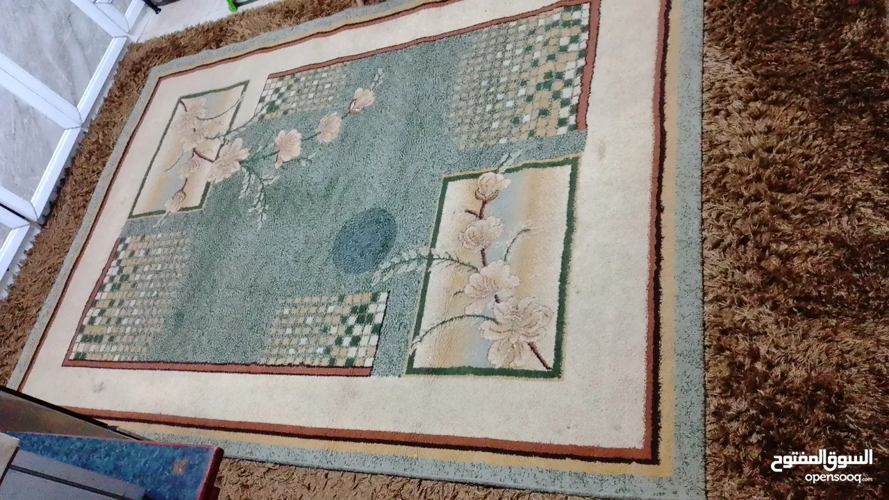 سجاده مستعمله طولها مترين و30 والعرض متر و70