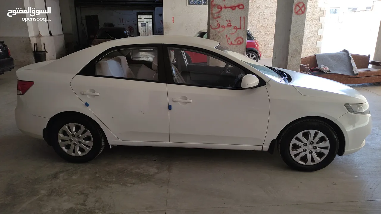 KIA Cerato 2012, White, Low milage