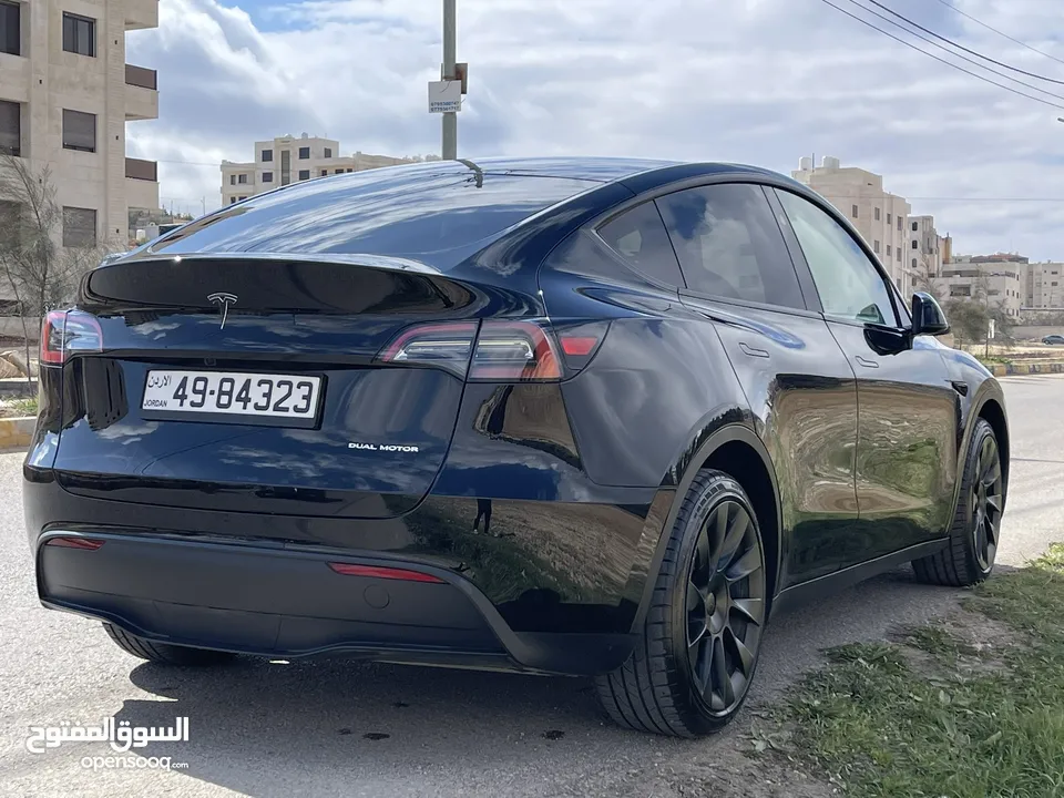 Tesla model y 2023 long range Dual motor  فحص اوتوسكور b+ 80 السيارة وكالة  السيارة 7 مقاعد