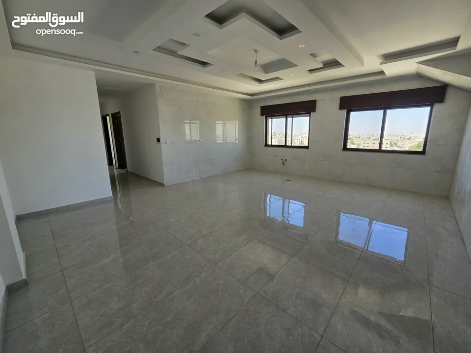 شقة يوبر ديلوكس طابق اخير مع روف مساحة 209 م ابو علندا إسكان الكهرباء