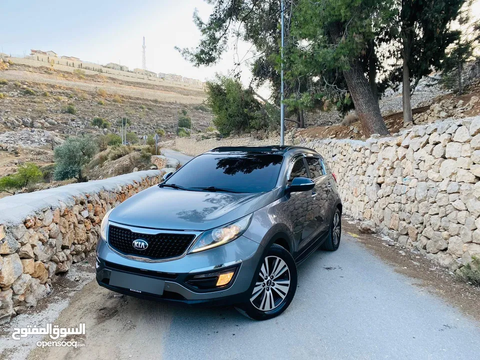 كيا سبورتاج فل الفل مع فتحة بسعر حرق 2015 رخصة