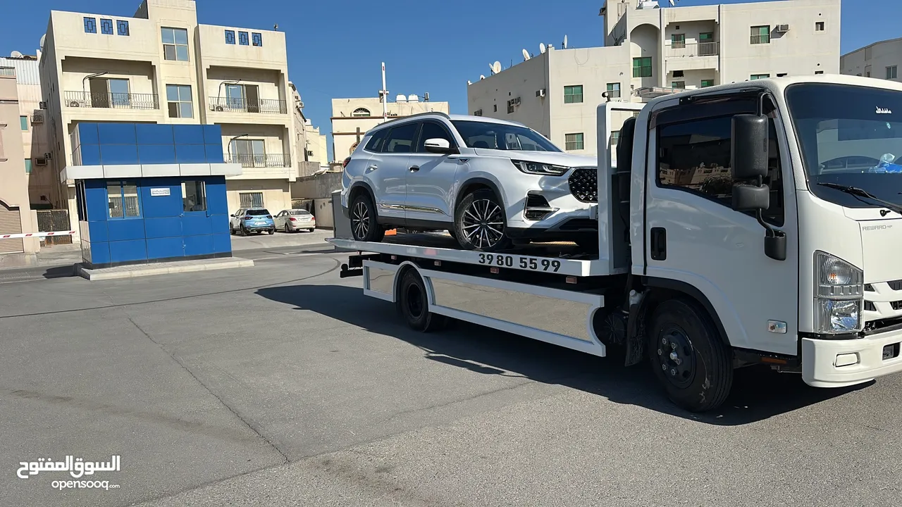 سطحة مدينة حمد 24 Hamad Town TOWING CAR 24 ونش رافعة رافعه نقل سطحة البحرين خدمات سحب سيارات