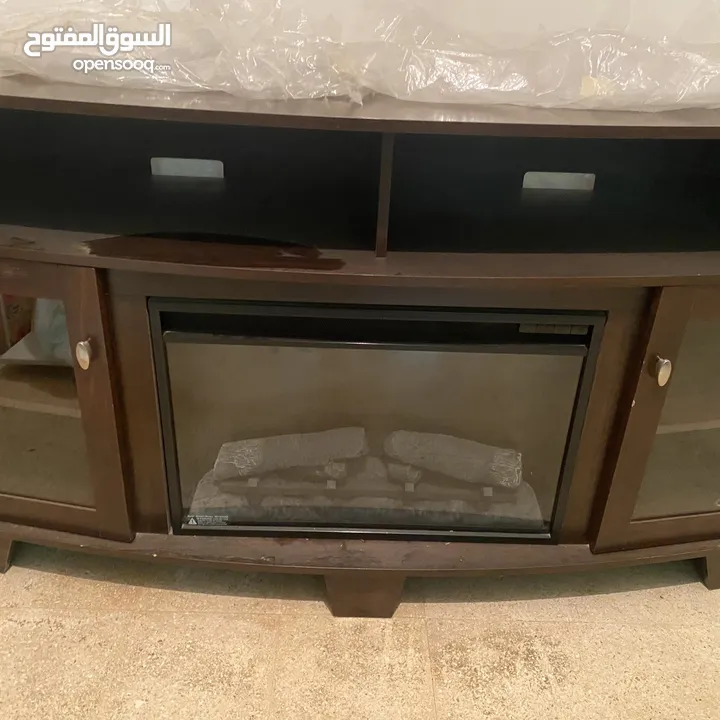 Tv stand with electrical fire place  خزانه للقعده مع فاير بليس كهربائيه