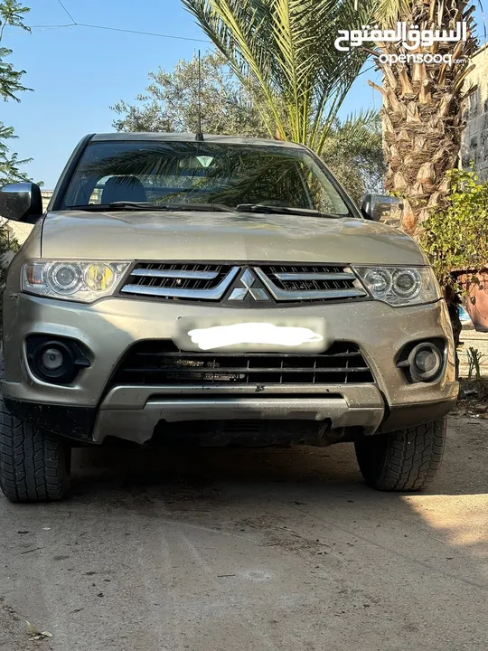 تندر متسبيشي L200 دفع خلفي 4x2 الحالة نظيف و السعر قابل لتفاوض مطور قير نظاف نظاف