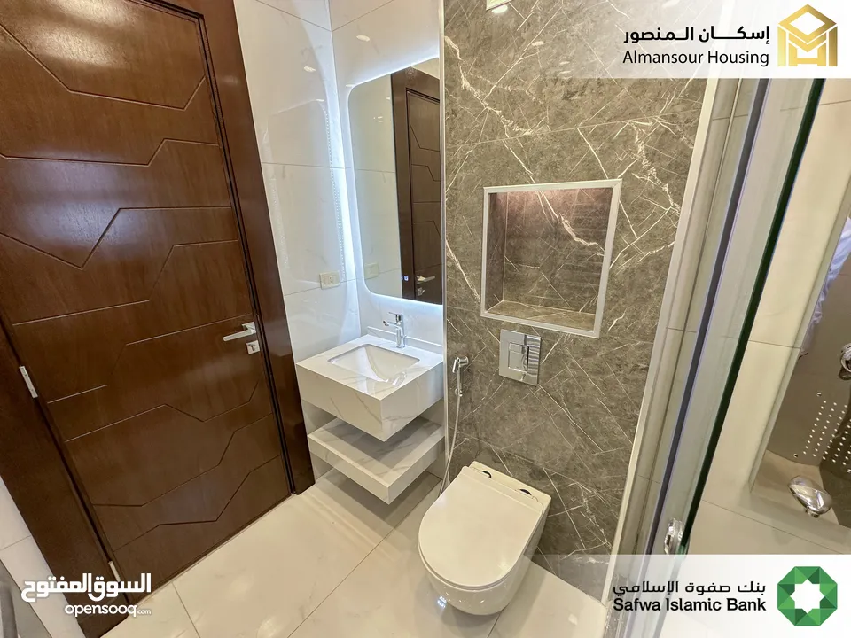 شقة ارضي معلق 190م2 يسار فاخرة للبيع في منطقة مكة مول/ مشروع مكة مول 5 (1/2) ( إسكان المنصور )
