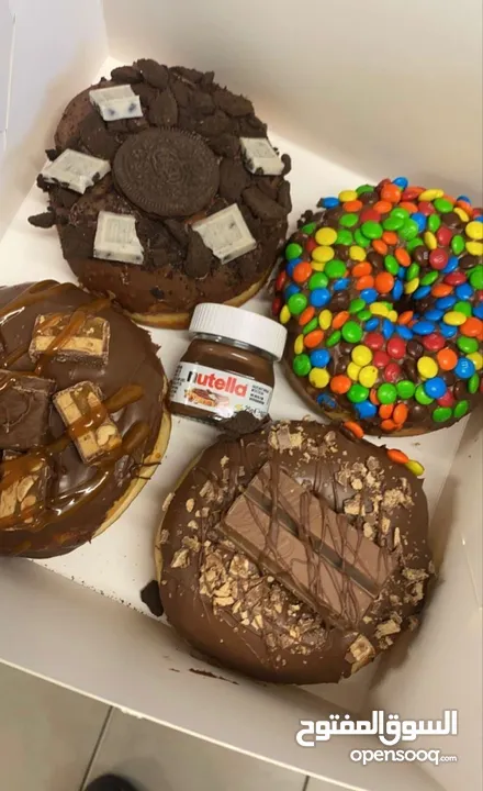 (رشة سكر)بتوفر توزيعات حلو للمناسبات دونات بأفخم الزينه تشيز كيك لوتوس كريب