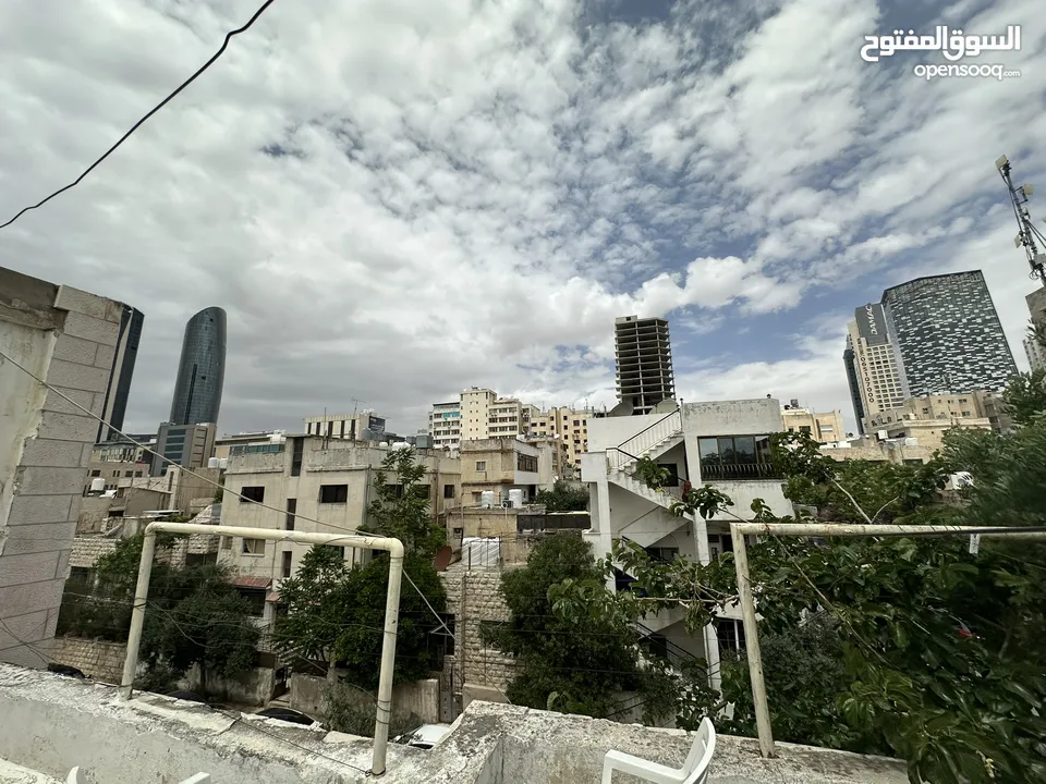 عمارة 8 شقق في العبدلي بجانب البوليفارد بدخل ممتاز للبيع بسعر الارض
