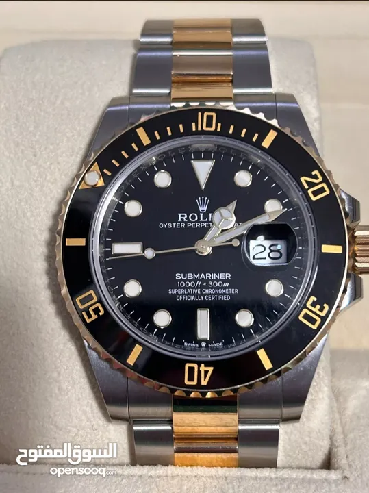 ساعة Rolex Submariner Silver and Gold Oyster Bracelet wBlack Bezel فيرست كوبي