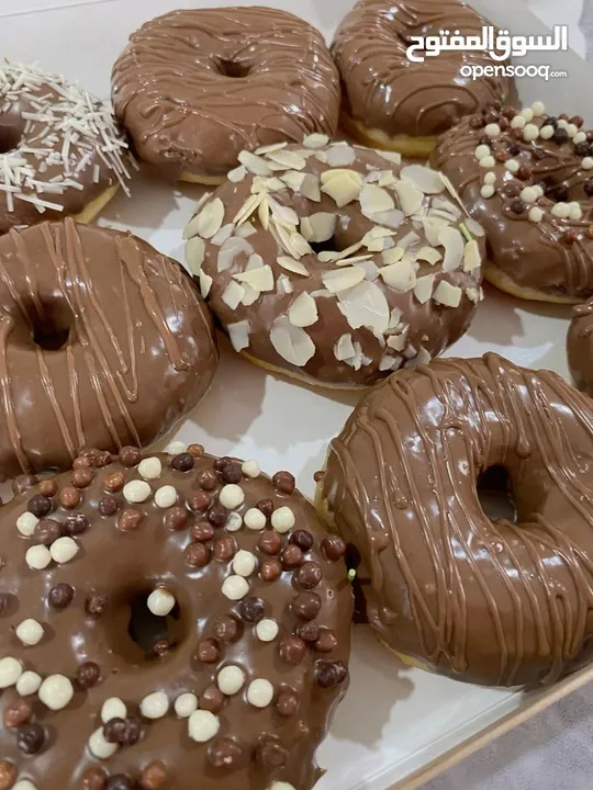(رشة سكر)بتوفر توزيعات حلو للمناسبات دونات بأفخم الزينه تشيز كيك لوتوس كريب