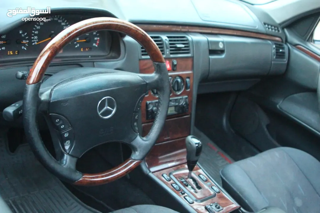 E200. 2002  قرش ونص 2002  رقم الهاتف بالوصف