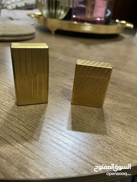ولاعتين ديبونت ( s t Dupont )صناعه فرنسيه مطلي بالذهب
