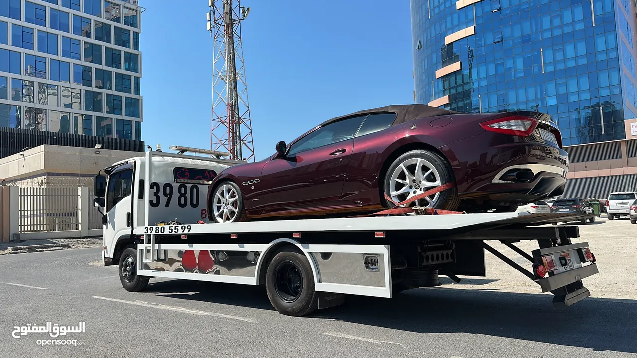 سطحة مدينة حمد 24 Hamad Town TOWING CAR 24 ونش رافعة رافعه نقل سطحة البحرين خدمات سحب سيارات