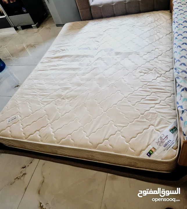 Queen Size Raha company medicated Bed spring mattress in Good Condition for urgent sale.