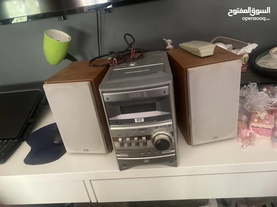 جهاز ستيريو DVD مع راديو ومشغل أقراص سي دي واشرطه عاديه القديمه مستعمل بحالة الوكاله
