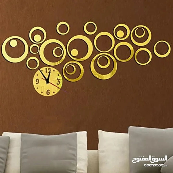 ساعه  حائط  ضخمه ديكور  ساعة  لون ذهبي و اسود و فضي مرآه و بني  حجمين