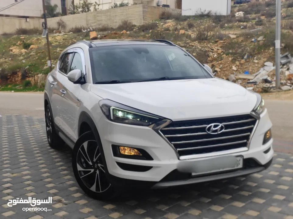 هونداي توسان بنزين فل مسكر اضافات دفع رباعي جيب بالكرتونة قطارة بالمصروف