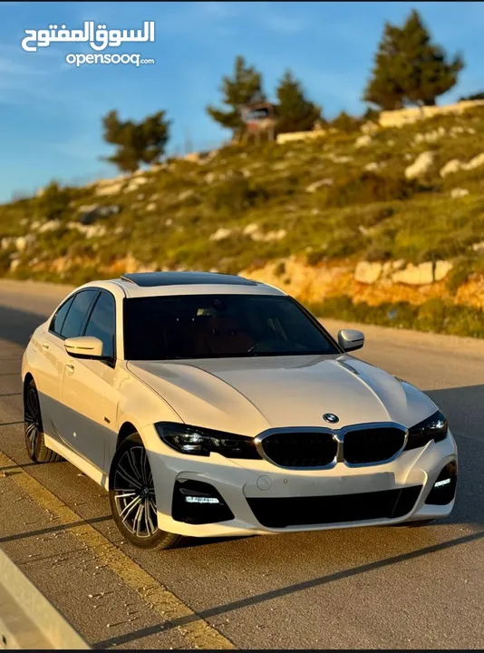 BMW 330e M package 2021 XDrive plagein haypred  4*4