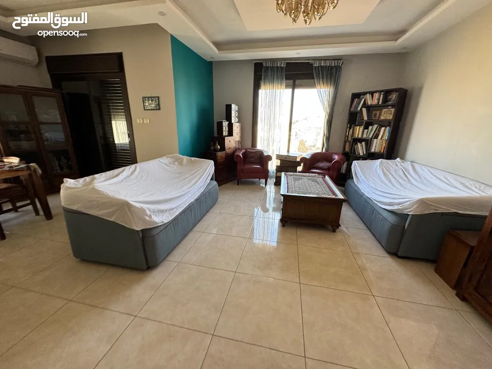 شقة مفروشة راقية للإيجار – طريق المطار  T213