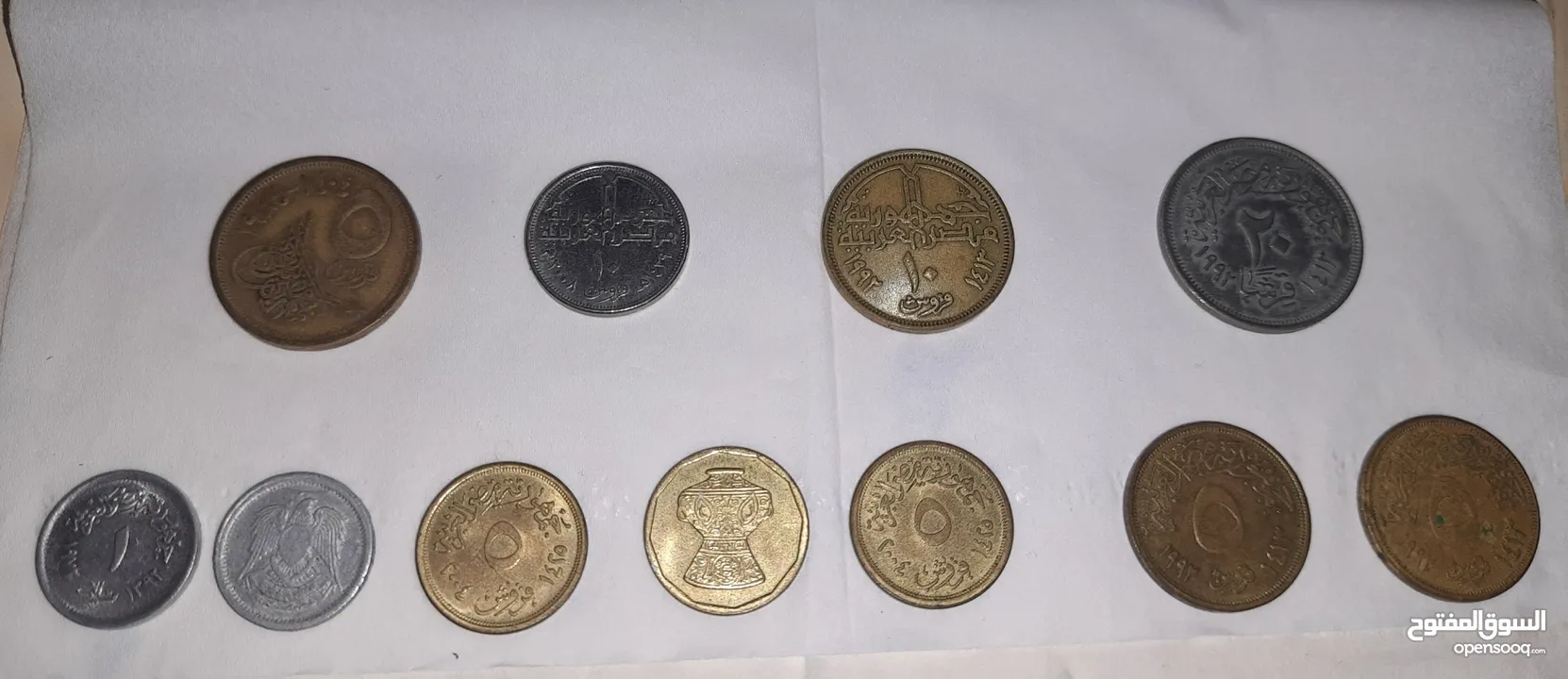 2 نيو بينس إليزابيث 1971 + مجموعه من العملات القديمه النقديه والورقيه بحاله ممتازه