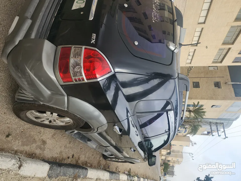 توسان  لون أسود 2006  بحاله ممتازة