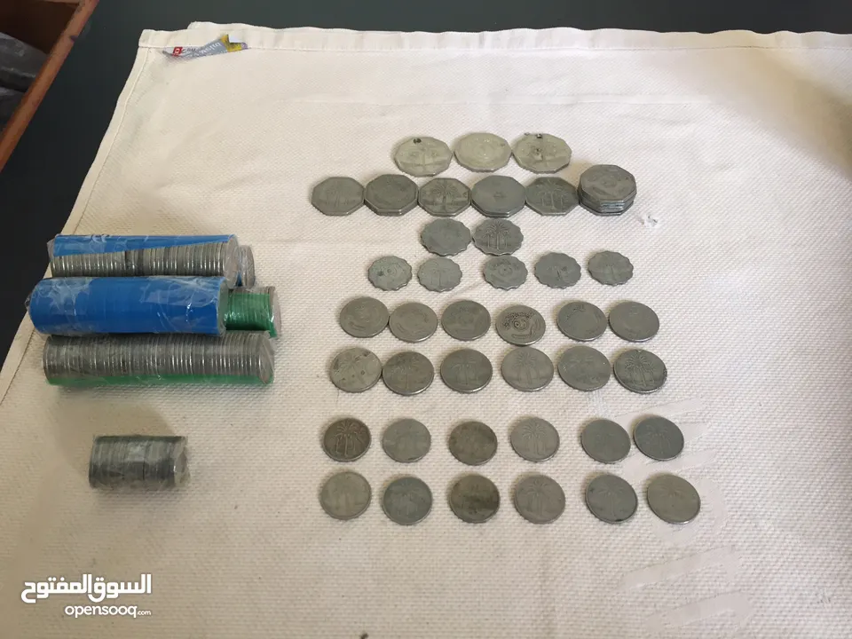 عملات معدنية مختلفة من دول مختلفة عربية و عالمية