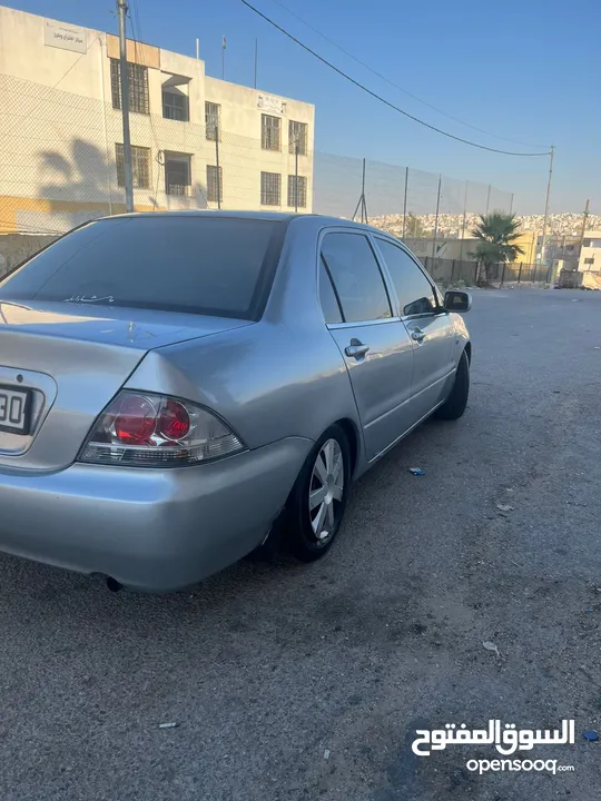 متسوبيشي لانسر 2004محدثه بالكامل 2013