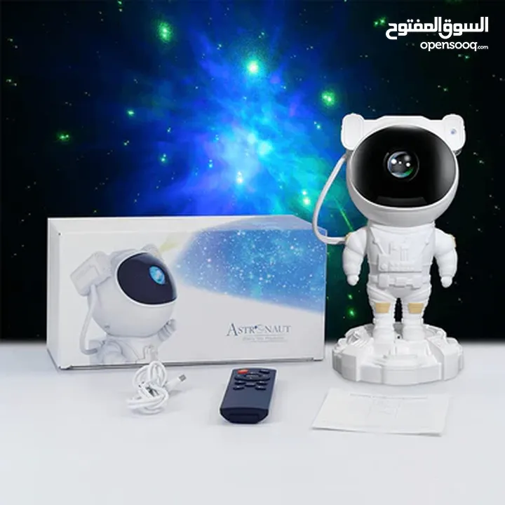 بروجيكتر رجل الفضاء مع نجوم واللوان جميلة مع مويسقى Astronaut Night Light Projector with Music