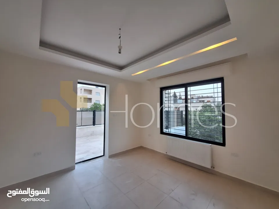 شقة ارضية مع حديقة للايجار في ضاحية الامير راشد