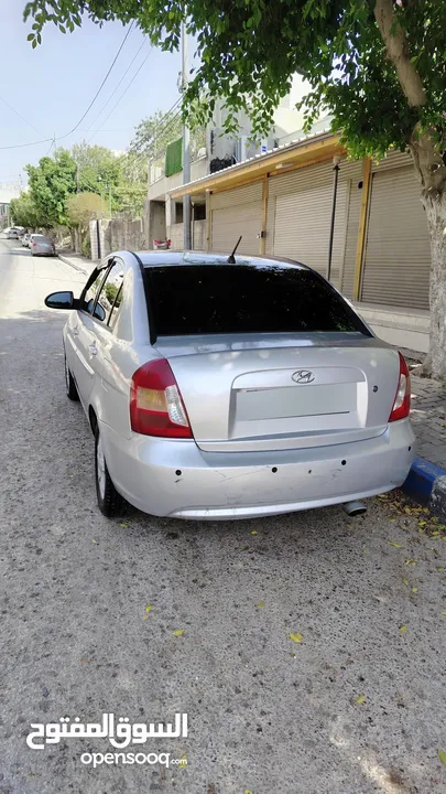 هونداي فيرنا 2006 مع كامل الإضافات  (شاشة لمس، كاميرا خلفية، شبابيك كهربا...)