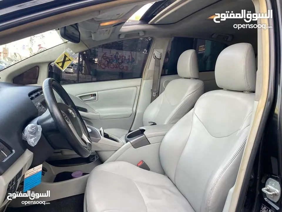 تويوتا بريوس 2015 هايبرد فل كامل مع بانوراما أعلى صنف بكج ( 5) لون اسود مميز