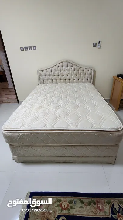 Bed with headboard