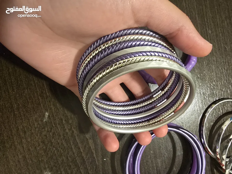 اساور بلاستيك بنفسجي، وفضي عدد 15