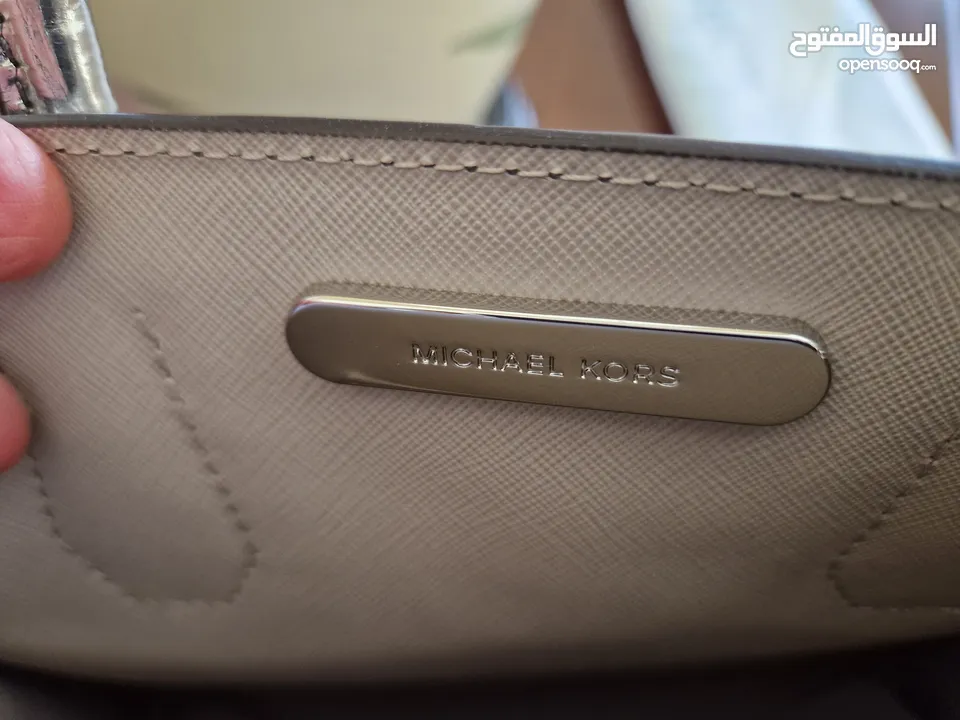 Like new Michael Kors crossbody bag metallic colour