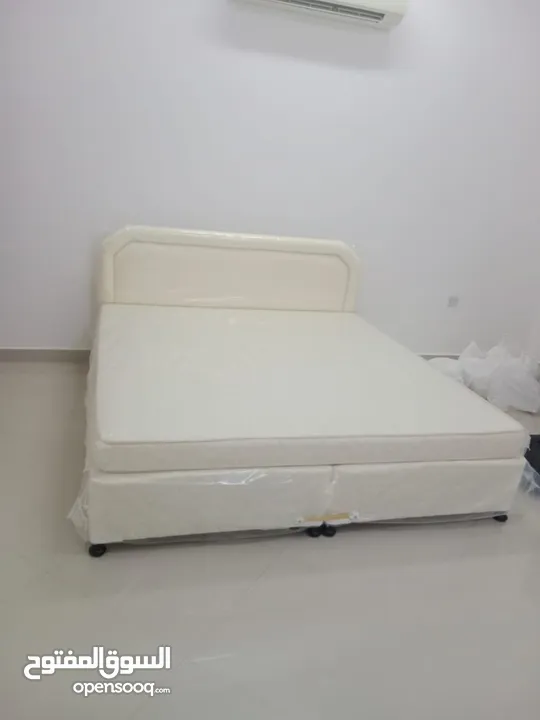 Bed with mattress on wholesale price delivery with extra charges according to the location