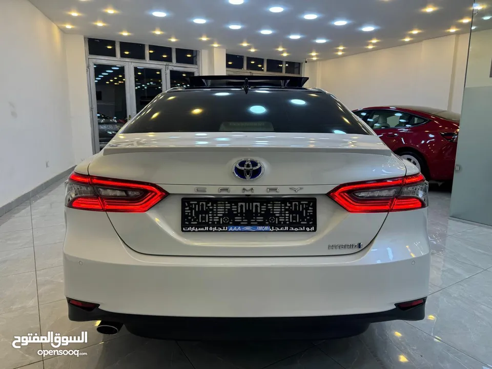 Toyota Camry hybrid (Lumiere ) 2021 وارد الفطيم صيانه الوكالة بالكامل ودهان الوكالة