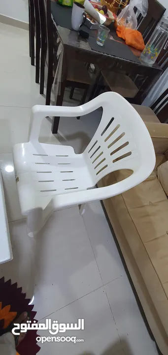 Plastic white table with chairs