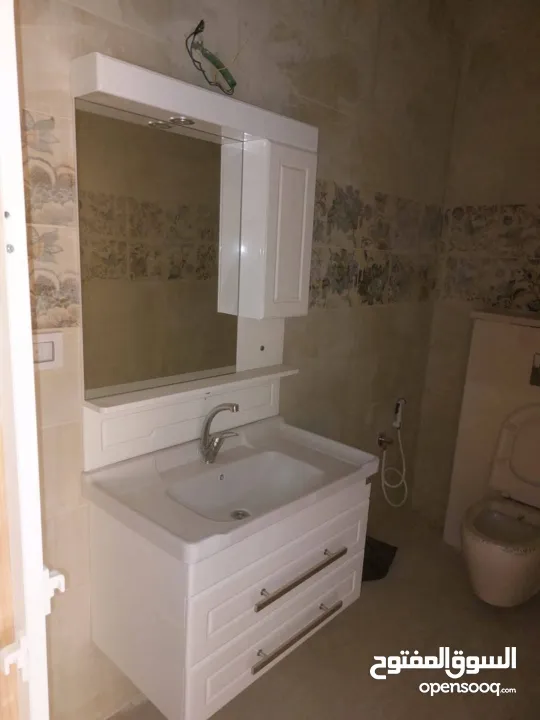 شقه للبيع بمدينه جنين حي البساتين