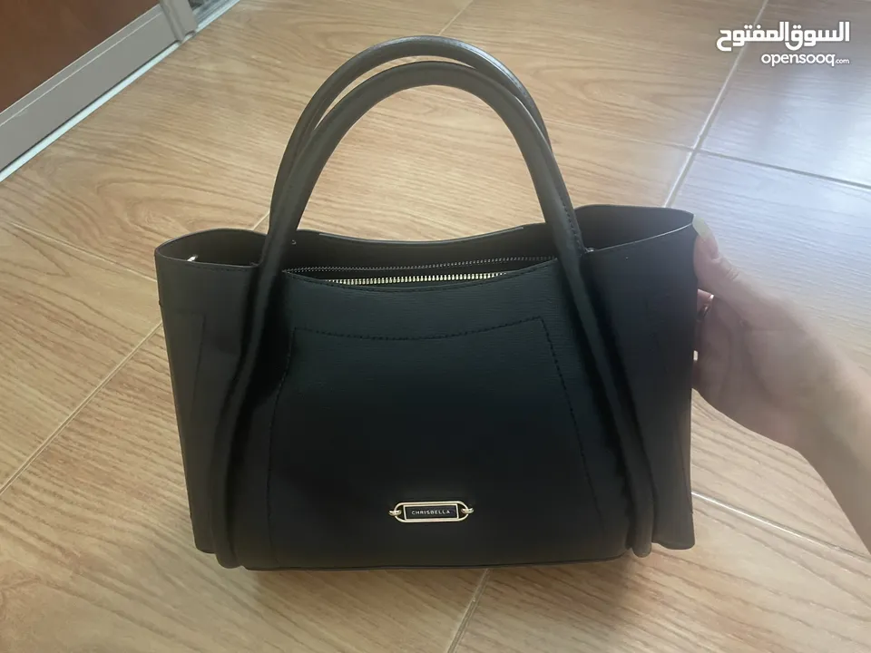 chris bella black leather purse for women. شنتة/شنطة/حقيبة كريس بيلا جلد اسود نسائية حجم كبير جديدة