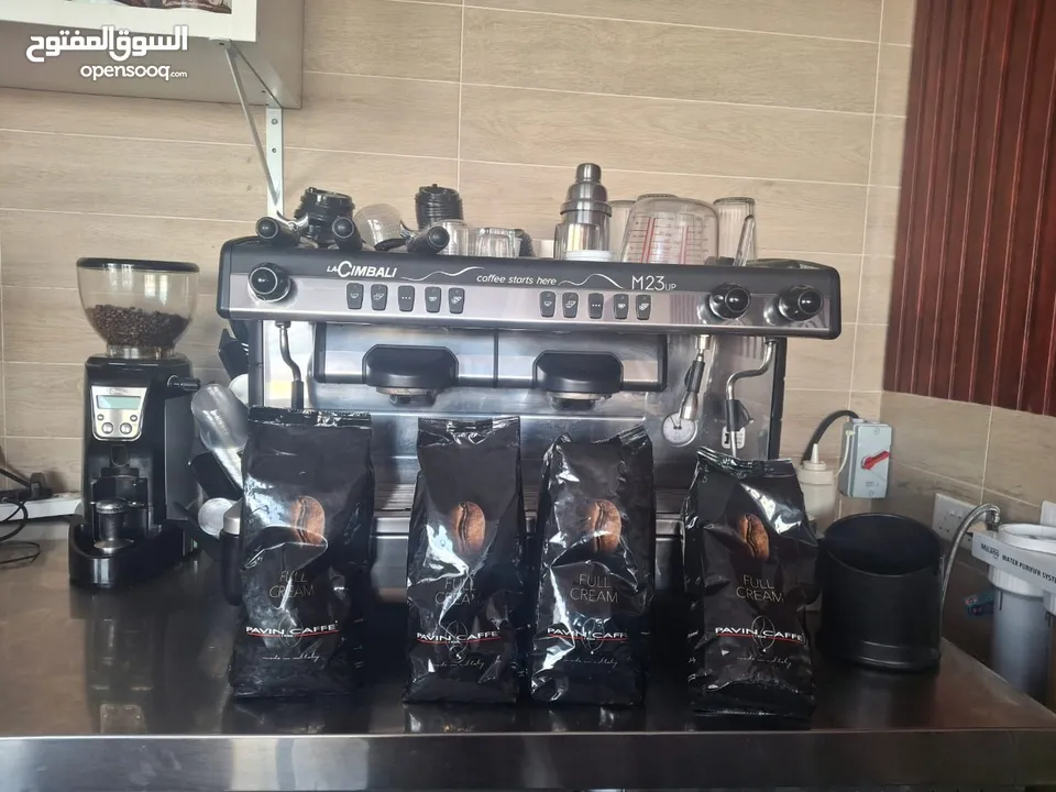 La Cimbali coffee machine with coffe beans La Cimbali  coffee grinder