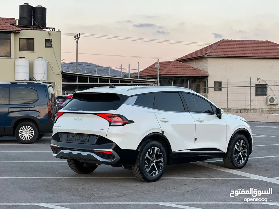 كايا سبورتاج /2022 فل بدون فتحة سقف  2x4 ///240Hp بنزين + كهرباء  ( Haybrid) 1600cc