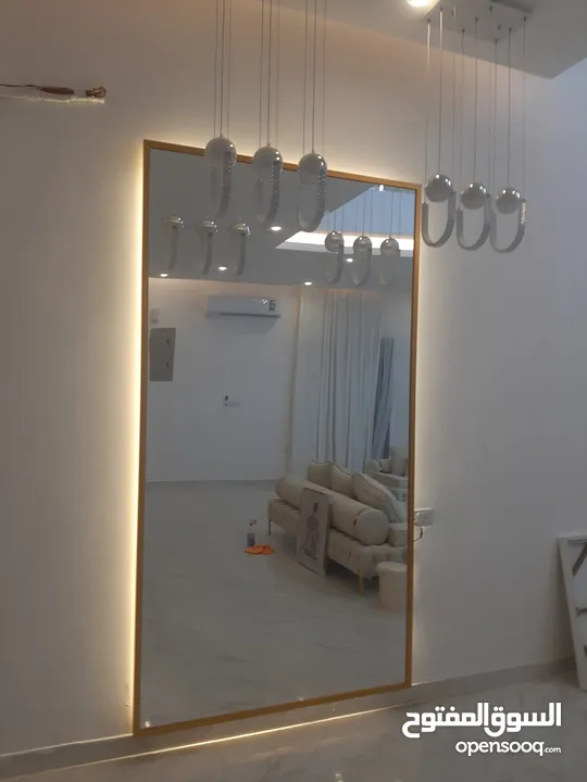 unshap mirror with stan & LED light.