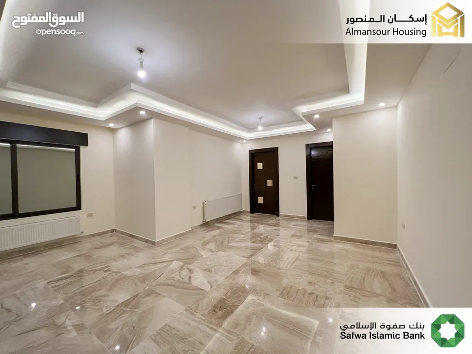 شقة شبه ارضية 175م2 فاخرة للبيع في طريق المطار/ مشروع لومينوس 1 ( إسكان المنصور )