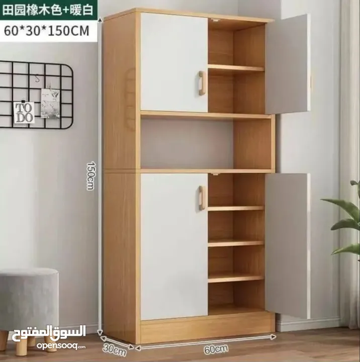 قدّمنا لك خزانة مطبخ خشب بـ 4 أبواب + رف وسطي بتصميم عملي وعصري الأبعاد: 150×30×60 سم