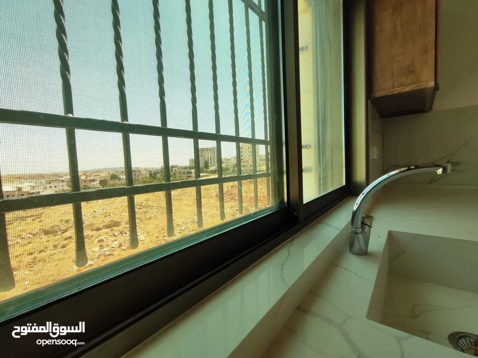 شقة جديدة غير مفروشة للإيجار – أول رافات  قرب سنقرط وصالات الهاشم سابقًا