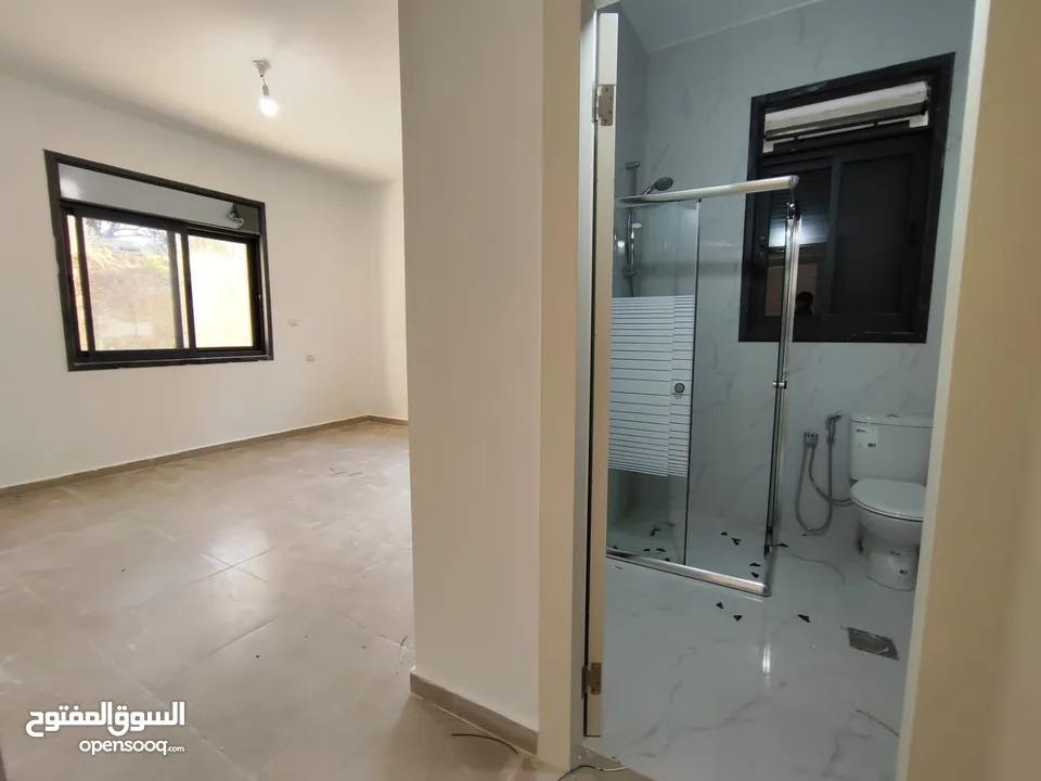 سكن مريح مع ساحة خارجية-شقة أرضية للإيجار – سردا  قرب مجمع أستوريا ووايكون مول