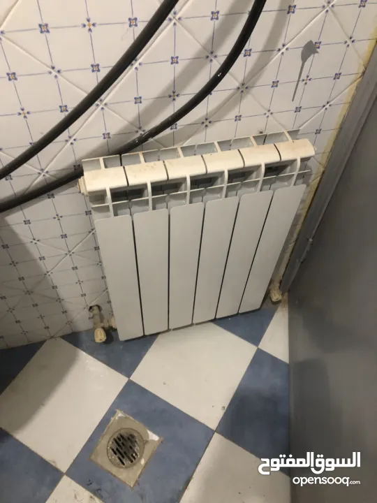 ماطور تدفئة مركزية مع خزان سولار مع الراديترات (المشعاعات)