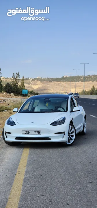 Tesla Model 3 Standerd Plus 2022 ابيض وداخليه ابيض جمرك جديد شهر 12‎ بسعر 20 الف بدون الرقم